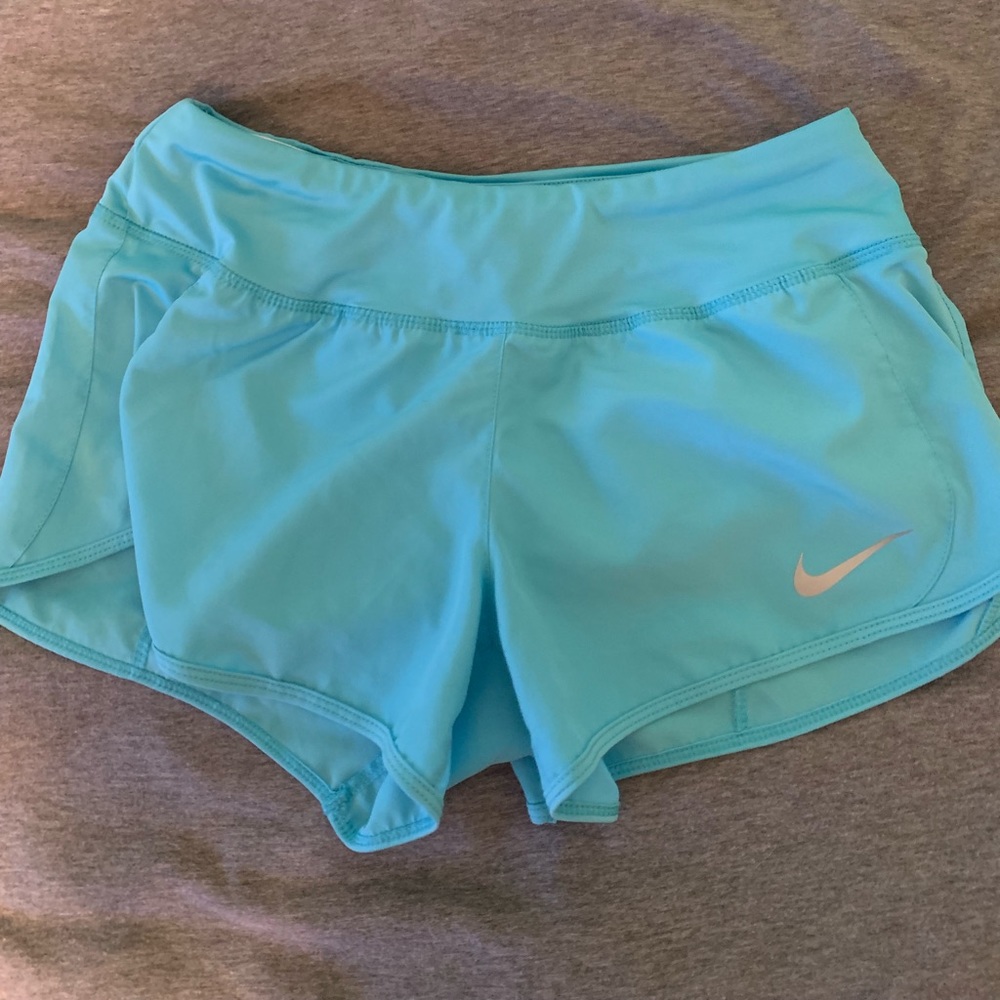 Light blue Nike running shorts